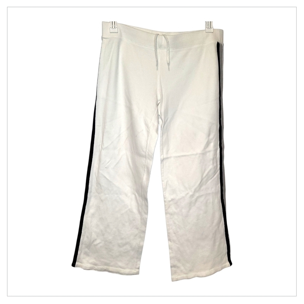 Jennifer Lopez White Track Pants with Black Side Stripes
